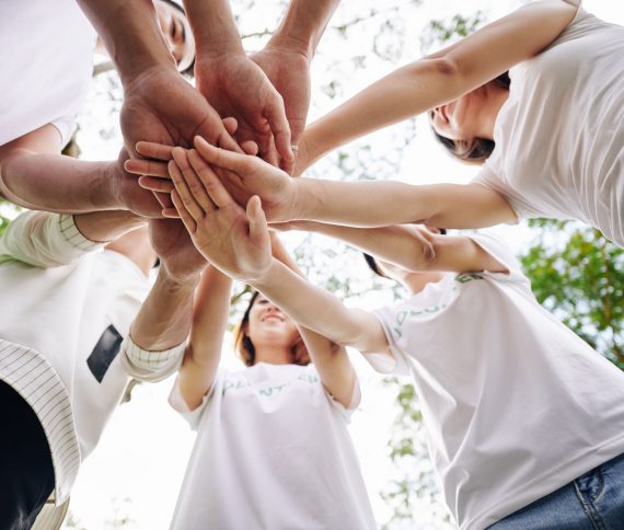 volunteers-showing-support-and-unity-SE9ND4P.jpg